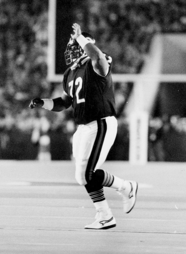 William Perry has reason to whoop it up during the Bears 23-7 win over Green Bay. Inserted into the game at fullback on Oct. 22, 1985, he scored a touchdown. (Chicago Tribune historical photo)