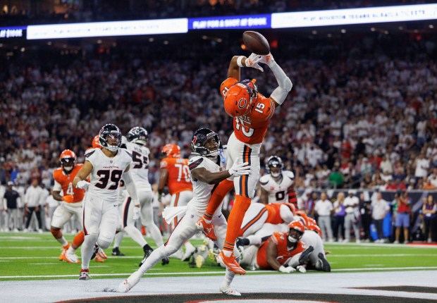 Chicago Bears wide receiver Rome Odunze (15) misses a touchdown...