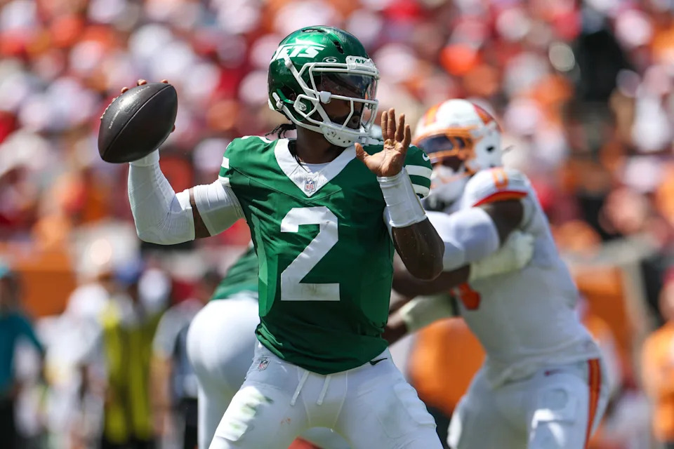 Sep 21, 2025; Tampa, Florida, USA; New York Jets quarterback Tyrod Taylor (2) looks to pass against the Tampa Bay Buccaneers in the second quarter at Raymond James Stadium. Mandatory Credit: Nathan Ray Seebeck-Imagn Images