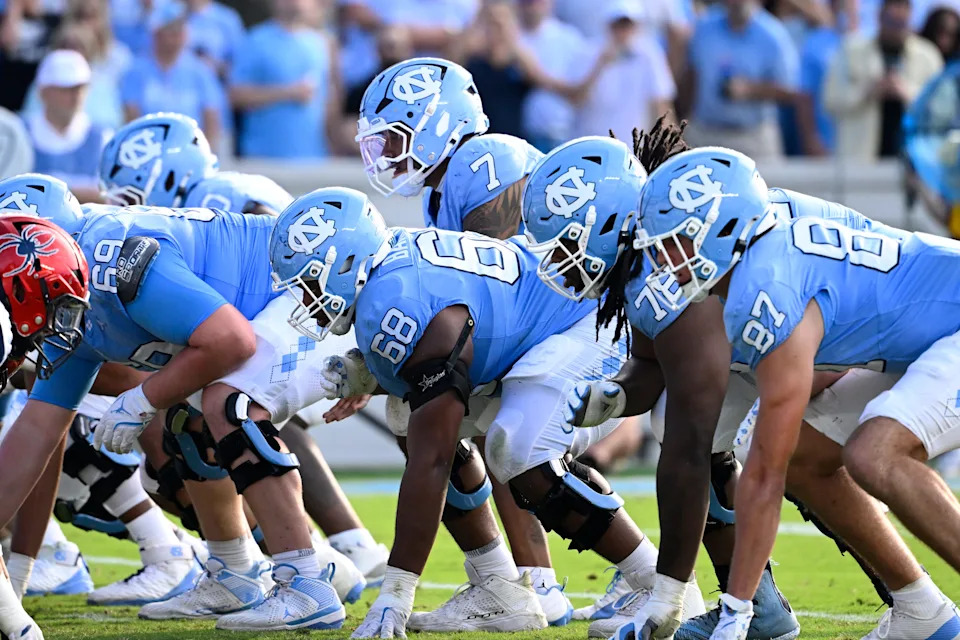 Sep 13, 2025; Chapel Hill, North Carolina, USA; North Carolina Tar Heels quarterback Gio Lopez (7) behind the line of scrimage in the third quarter at Kenan Stadium. Mandatory Credit: Bob Donnan-Imagn Images