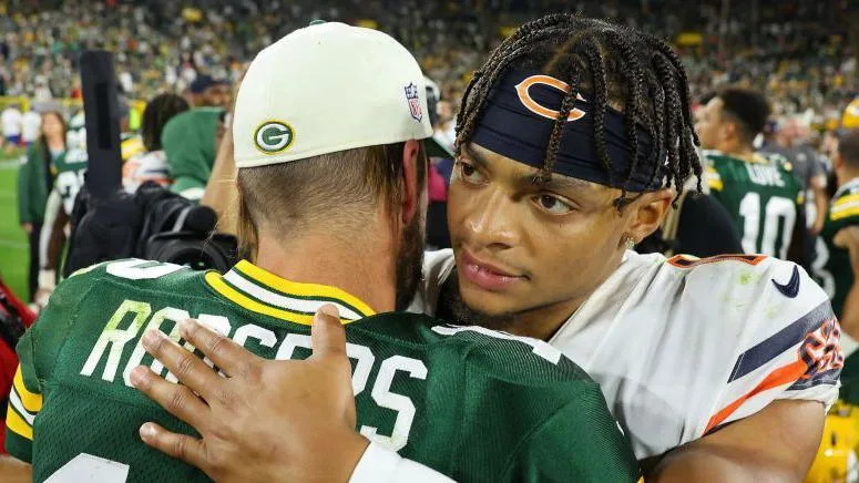 Aaron Rodgers hugs Justin Fields after a game between the Green Bay Packers and Chicago Bears in September 2022