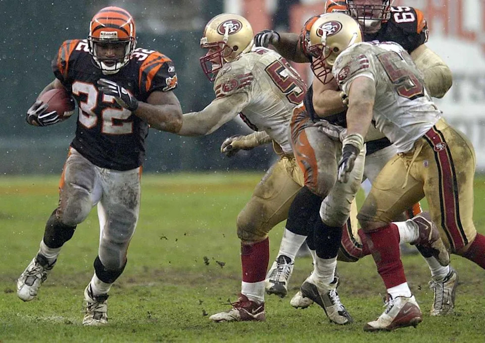SUNDAY DECEMBER 14, 2003 BENGALS SPORTS The Cincinnati Bengals defeated the San Fransisco 49ers 41-38 at Paul Brown Stadium. Rudi Johnson (32) rushed for 174 yards on 21 carries and two touchdowns in leading the Bengals offense. Cincinnati Enquirer/Michael E. Keating.© Michael E&period; Keating&comma; Cincinnati Enquirer via Imagn Content Services&comma; LLC
