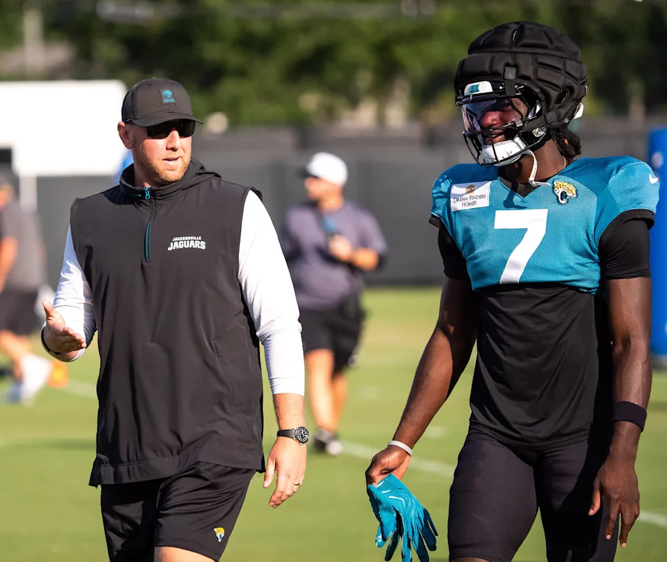 Jacksonville Jaguars Head Coach Liam Coen talks with Jacksonville Jaguars wide receiver Brian Thomas Jr. during an NFL training camp session ten at the Miller Electric Center, Tuesday, Aug. 5, 2025, in Jacksonville, Fla. [Doug Engle/Florida Times-Union]