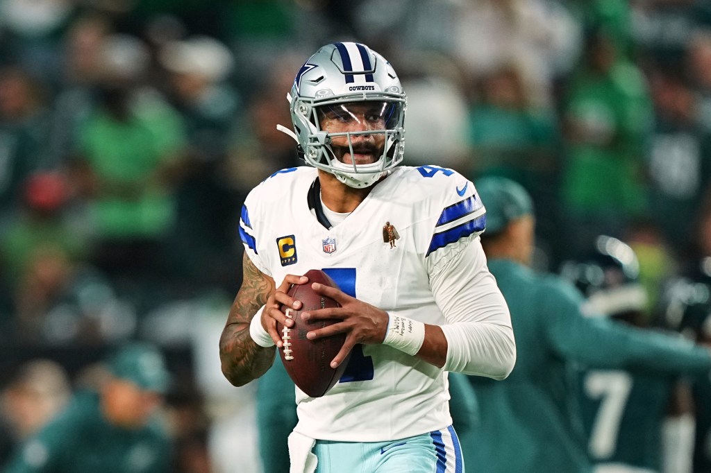 Dallas Cowboys quarterback Dak Prescott warms up before an NFL football game against the Philadelphia Eagles Thursday, Sept. 4, 2025, in Philadelphia. 