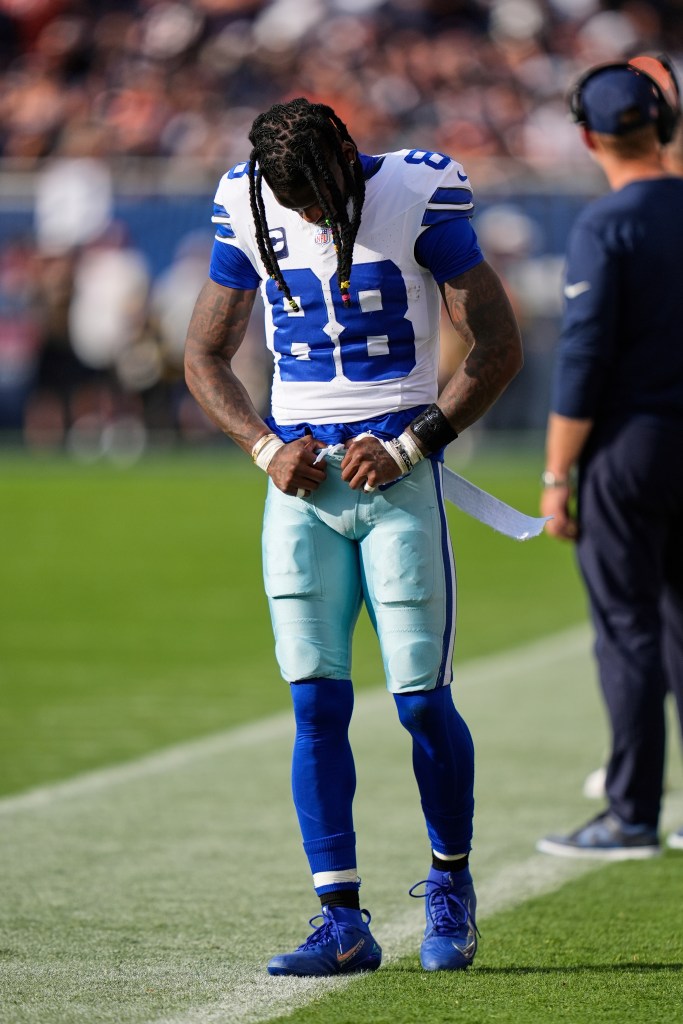 Dallas Cowboys wide receiver CeeDee Lamb on the sideline after an injury.