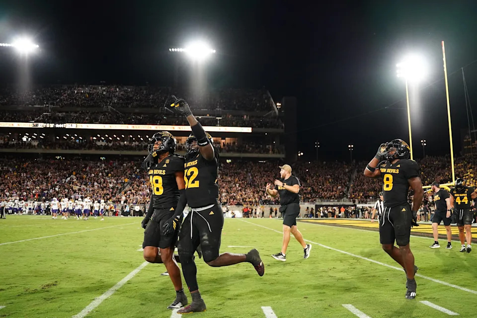 Sep 26, 2025; Tempe, Arizona, USA; Arizona State Sun Devils linebacker Martell Hughes (18) celebrates a game winning interception with defensive lineman Prince Dorbah (32) and linebacker Jordan Crook (8) in the second half at Mountain America Stadium.
