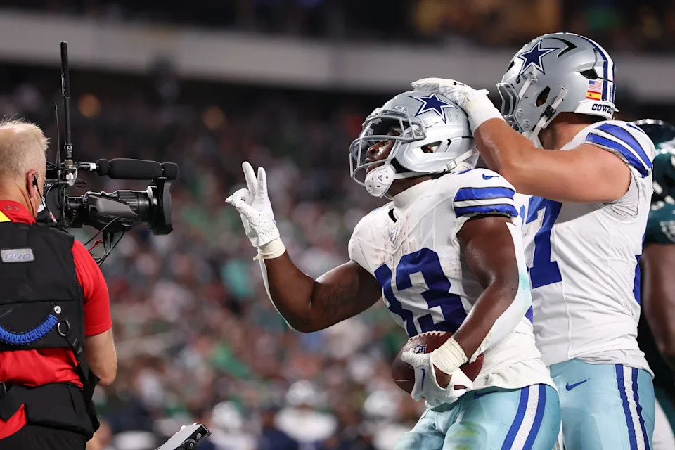 Sep 4, 2025; Philadelphia, Pennsylvania, USA; Dallas Cowboys running back Javonte Williams (33) celebrates with his teammates after scoring a touchdown against the Philadelphia Eagles during the first quarter of the game at Lincoln Financial Field. Mandatory Credit: Bill Streicher-Imagn Images