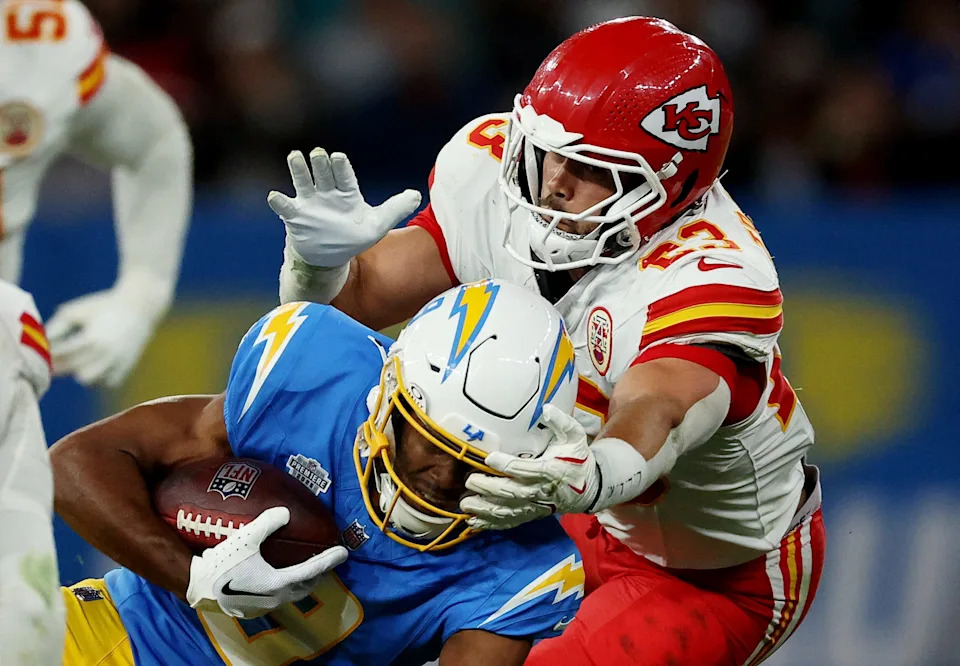 [US, Mexico & Canada customers only] Sep 5, 2025; Sao Paulo, BRAZIL; Los Angeles Chargers running back Omarion Hampton (8) runs against Kansas City Chiefs linebacker Drue Tranquill (23) in the second half during a NFL game at Corinthians Arena. Mandatory Credit: Amanda Perobelli/Reuters via Imagn Images