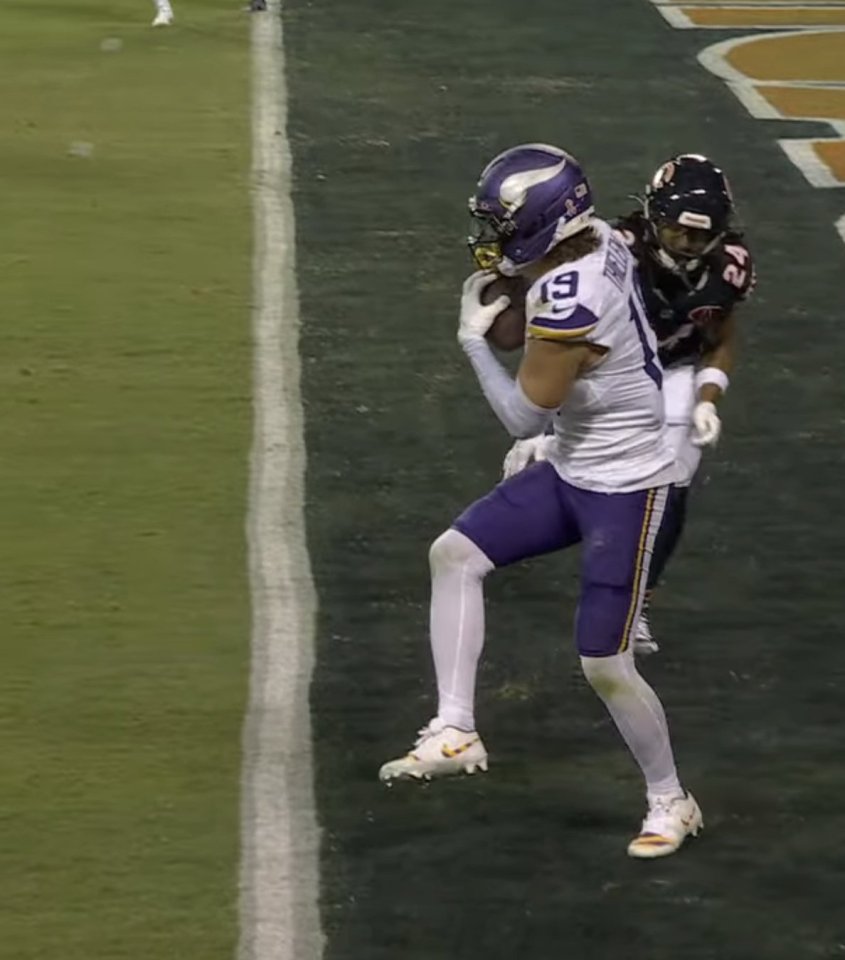 Football player making a catch.