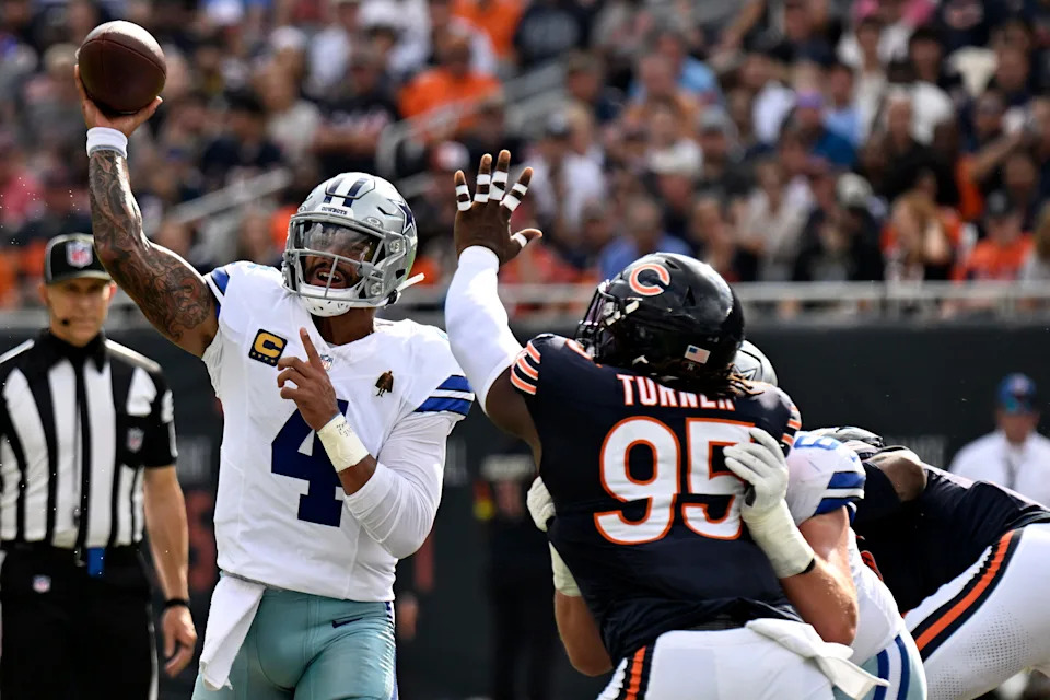 Sep 21, 2025; Chicago, Illinois, USA; Dallas Cowboys quarterback Dak Prescott (4) drops back to pass against the Chicago Bears during the first half at Soldier Field. Mandatory Credit: Matt Marton-Imagn Images
