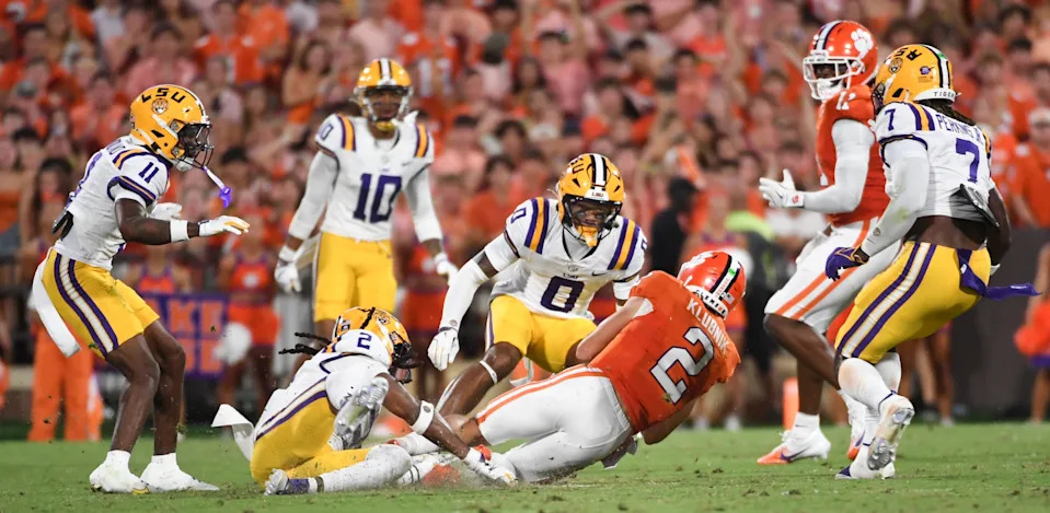 LSU Tigers safety Jardin Gilbert (2) tackles Clemson Tigers quarterback Cade Klubnik (2) Saturday, Aug. 30, 2025 during the NCAA football game at Memorial Stadium in Clemson, South Carolina.