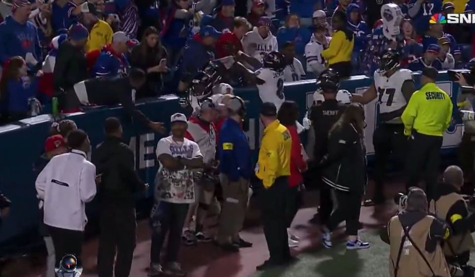 Lamar Jackson confronting a Buffalo Bills fan.