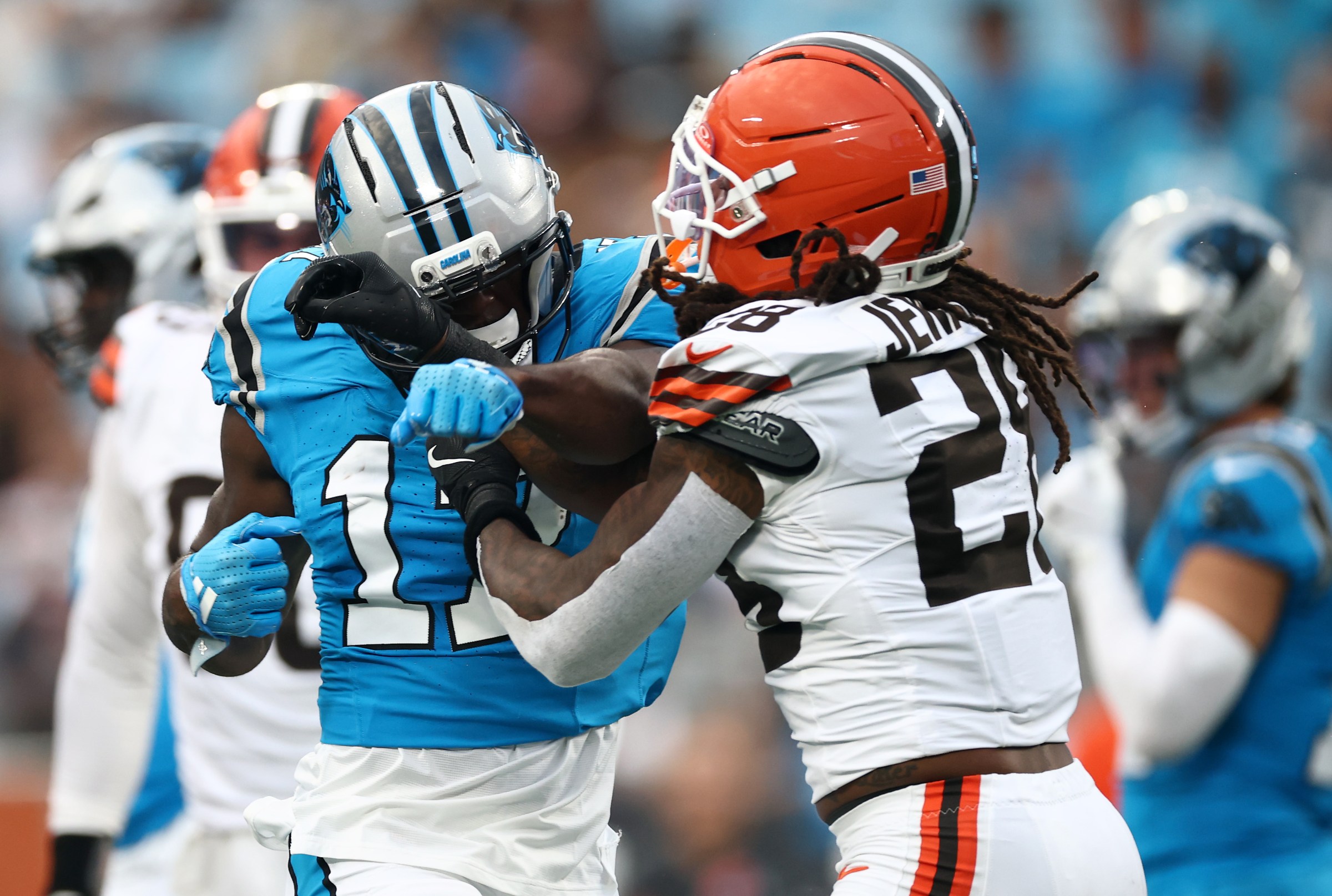 CHARLOTTE, NORTH CAROLINA - AUGUST 08: Wide receiver Xavier Legette #17 of the Carolina Panthers and safety Rayshawn Jenkins #28 of the Cleveland Browns have an altercation in the first half during the NFL Preseason 2025 game at Bank of America Stadium on August 08, 2025 in Charlotte, North Carolina. (Photo by Jared C. Tilton/Getty Images)