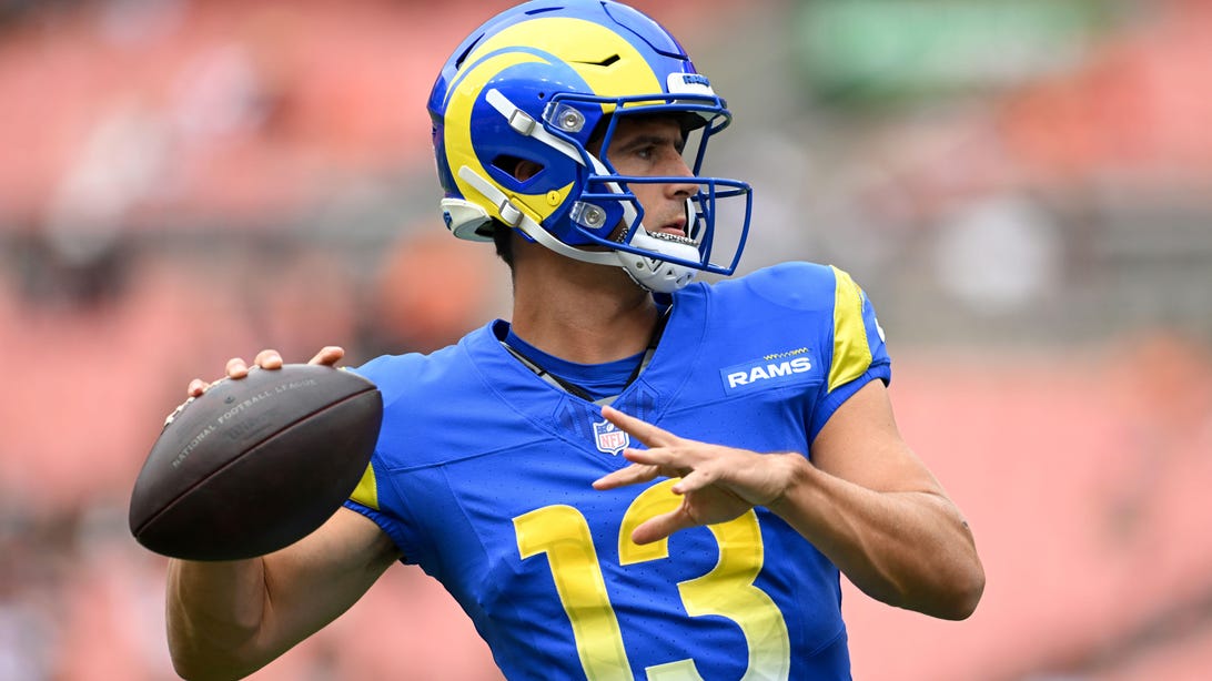 CLEVELAND, OHIO - AUGUST 23: Stetson Bennett IV #13 of the Los Angeles Rams warms up prior to an NFL Preseason 2025 game against the Cleveland Browns at Huntington Bank Field on August 23, 2025 in Cleveland, Ohio.