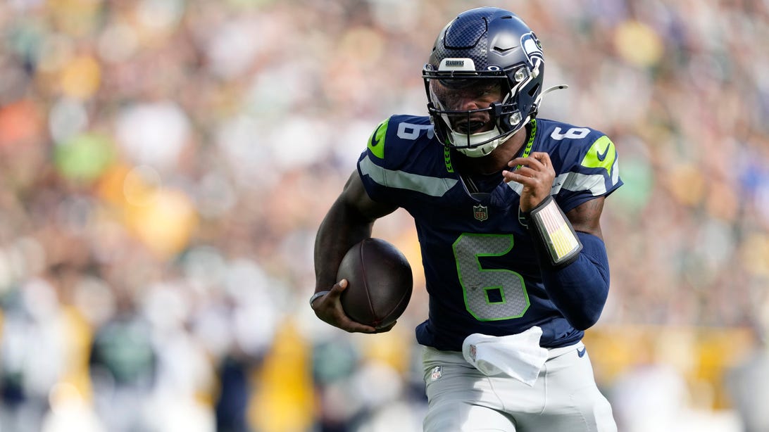 GREEN BAY, WISCONSIN - AUGUST 23: Jalen Milroe #6 of the Seattle Seahawks runs with the ball in the second quarter during the NFL Preseason 2025 game between Seattle Seahawks and Green Bay Packers at Lambeau Field on August 23, 2025 in Green Bay, Wisconsin.