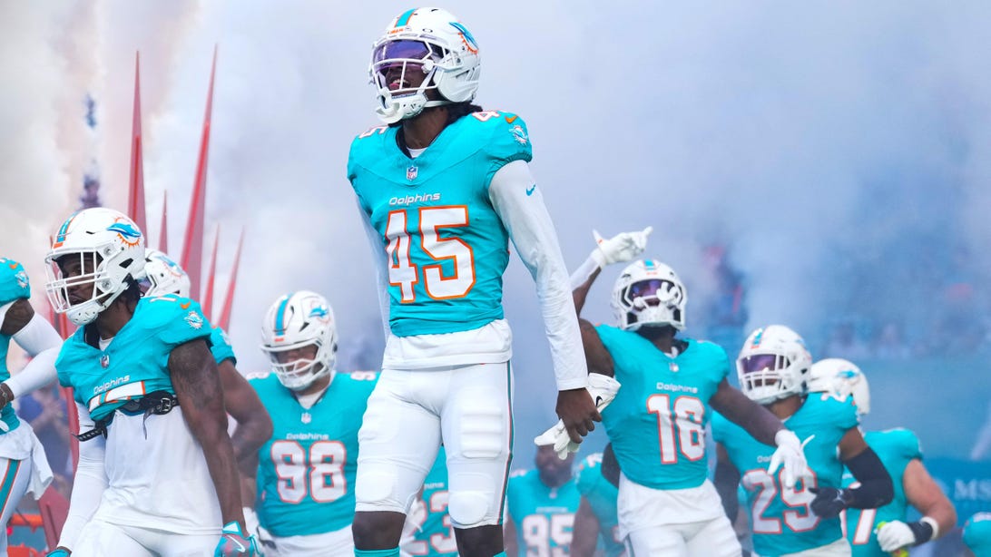 MIAMI GARDENS, FLORIDA - AUGUST 23: BJ Adams #45 of the Miami Dolphins enters the field prior to a NFL Preseason 2025 game between Jacksonville Jaguars and Miami Dolphins at Hard Rock Stadium on August 23, 2025 in Miami Gardens, Florida.