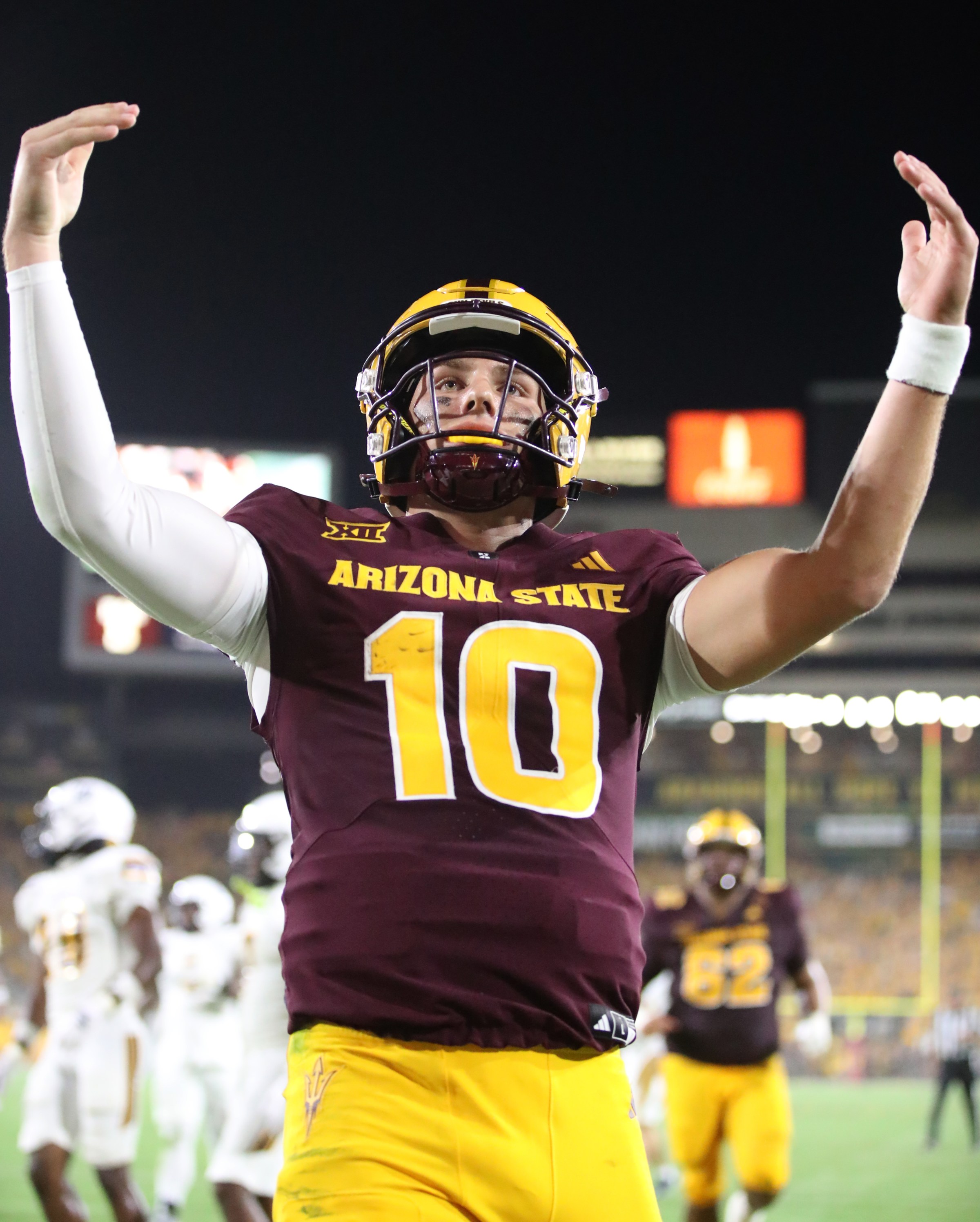 TEMPE, ARIZONA - AUGUST 30: Quarterback Sam Leavitt #10 of the Arizona State Sun Devils celebrates in the endzone after scoring a 18-yard touchdown during the second half of the Northern Arizona University Lumberjacks versus the Arizona State University Sun Devils football game at Mountain America Stadium on August 30, 2025 in Tempe, Arizona. (Photo by Bruce Yeung/Getty Images)