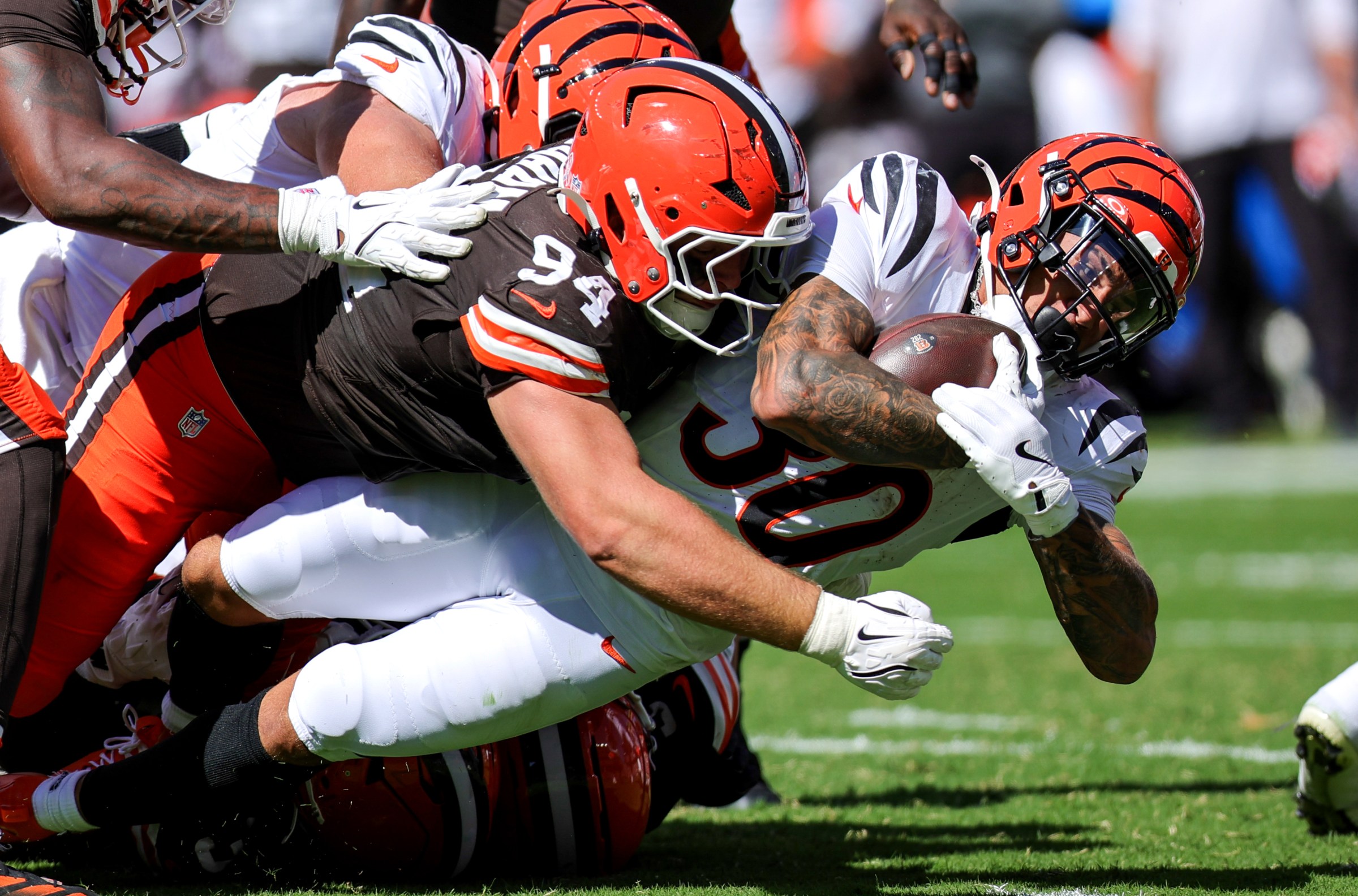 CLEVELAND, OH - SEPTEMBER 07: Cleveland Browns defensive tackle Mason Graham (94) tackled Cincinnati Bengals running back Chase Brown (30) during the third quarter of the National Football League game between the Cincinnati Bengals and Cleveland Browns on September 7, 2025, at Huntington Bank Field in Cleveland, OH. (Photo by Frank Jansky/Icon Sportswire via Getty Images)
