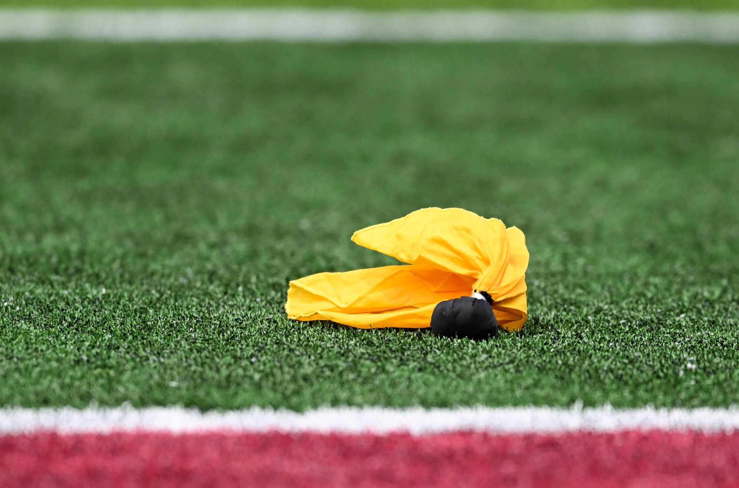 BLOOMINGTON, IN - SEPTEMBER 06: A yellow penalty flag sits on the ground during a college football game between the Kennesaw State Owls and Indiana Hoosiers on September 06, 2025 at Memorial Stadium in Bloomington, IN (Photo by James Black/Icon Sportswire via Getty Images)