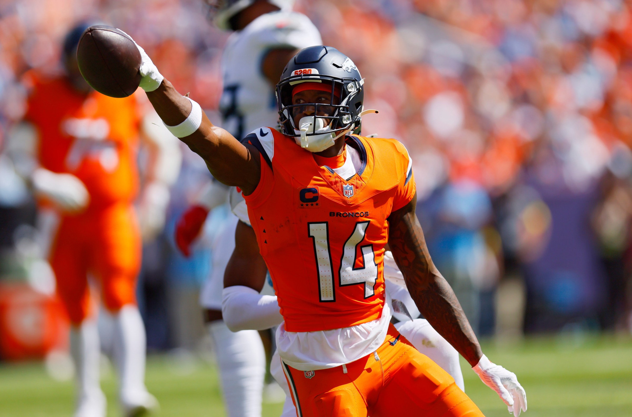 DENVER, COLORADO - SEPTEMBER 07: Courtland Sutton #14 of the Denver Broncos reacts after a first down during the first quarter against the Tennessee Titans during the game at Empower Field At Mile High on September 07, 2025 in Denver, Colorado. (Photo by Justin Edmonds/Getty Images)