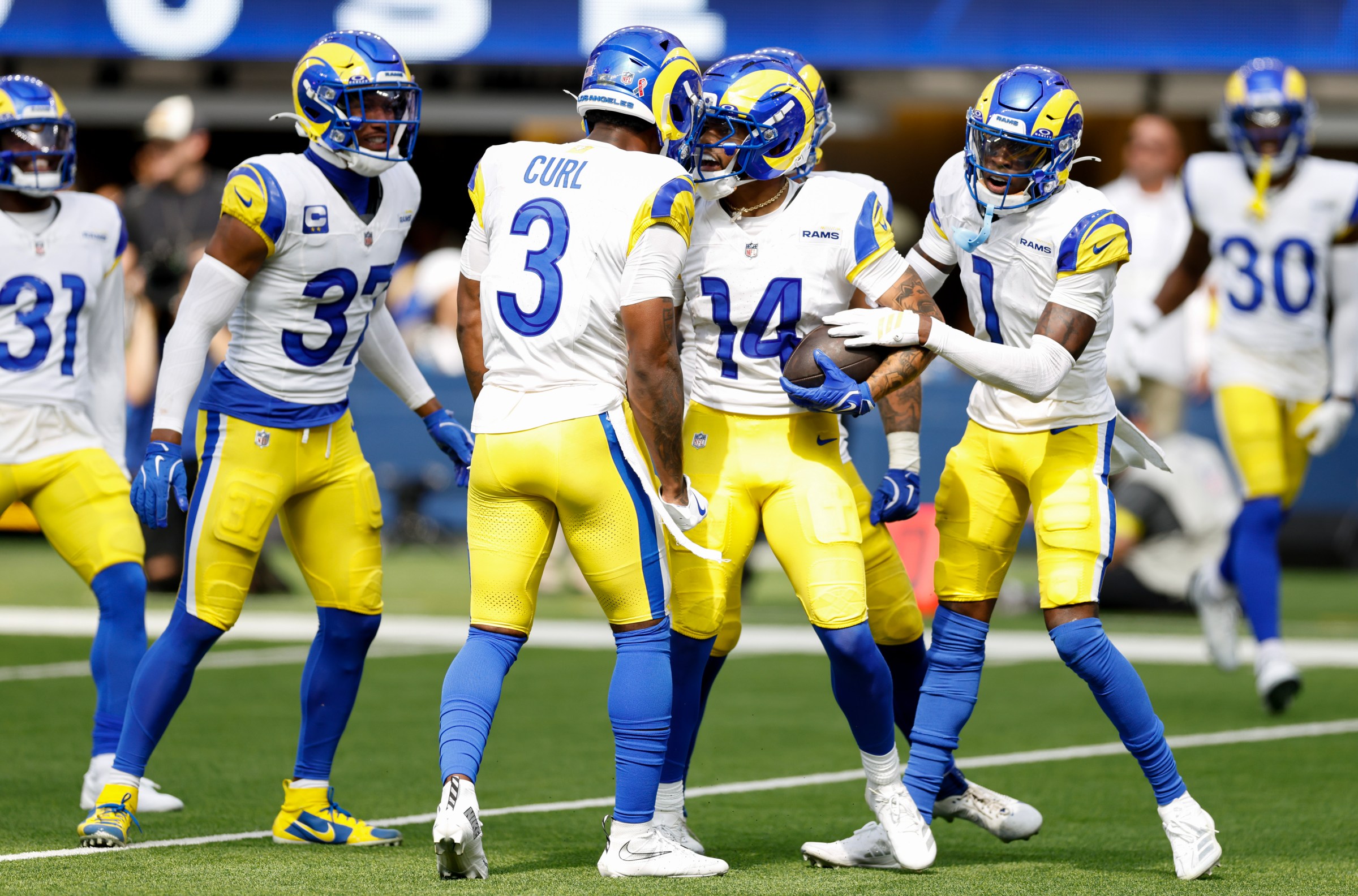 INGLEWOOD, CALIFORNIA - SEPTEMBER 07: Cobie Durant #14 of the Los Angeles Rams celebrates a interception during the third quarter against the Houston Texans at SoFi Stadium on September 07, 2025 in Inglewood, California. (Photo by Ronald Martinez/Getty Images)