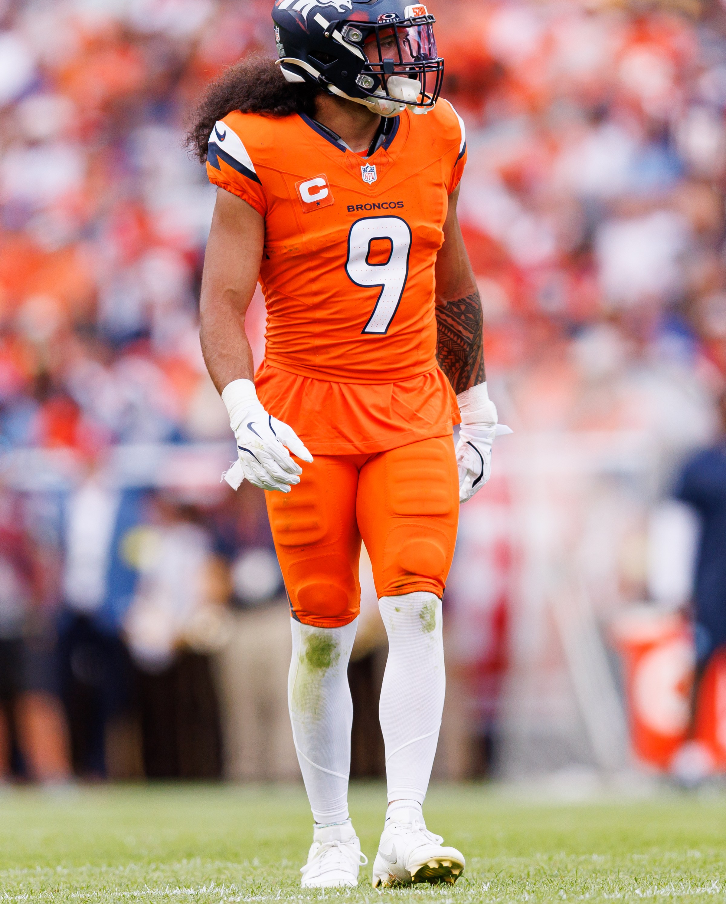 DENVER, COLORADO - SEPTEMBER 07: Talanoa Hufanga #9 of the Denver Broncos stands on the field during an NFL football game against the Tennessee Titans, at Empower Field at Mile High on September 7, 2025 in Denver, Colorado. (Photo by Brooke Sutton/Getty Images)