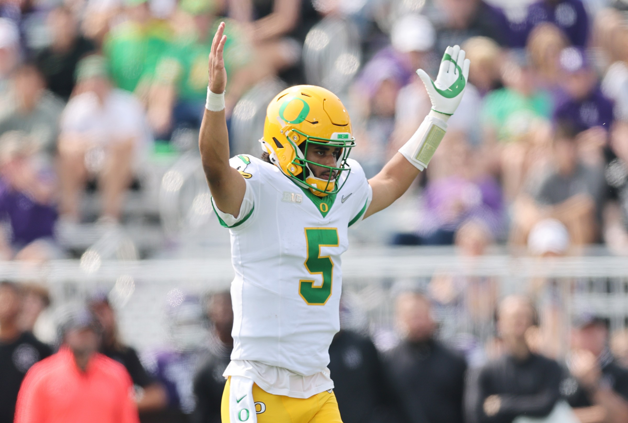 EVANSTON, ILLINOIS - SEPTEMBER 13: Dante Moore #5 of the Oregon Ducks celebrates a touchdown against the Northwestern Wildcats during the second half at Northwestern Medicine Field at Martin Stadium on September 13, 2025 in Evanston, Illinois. (Photo by Michael Reaves/Getty Images)