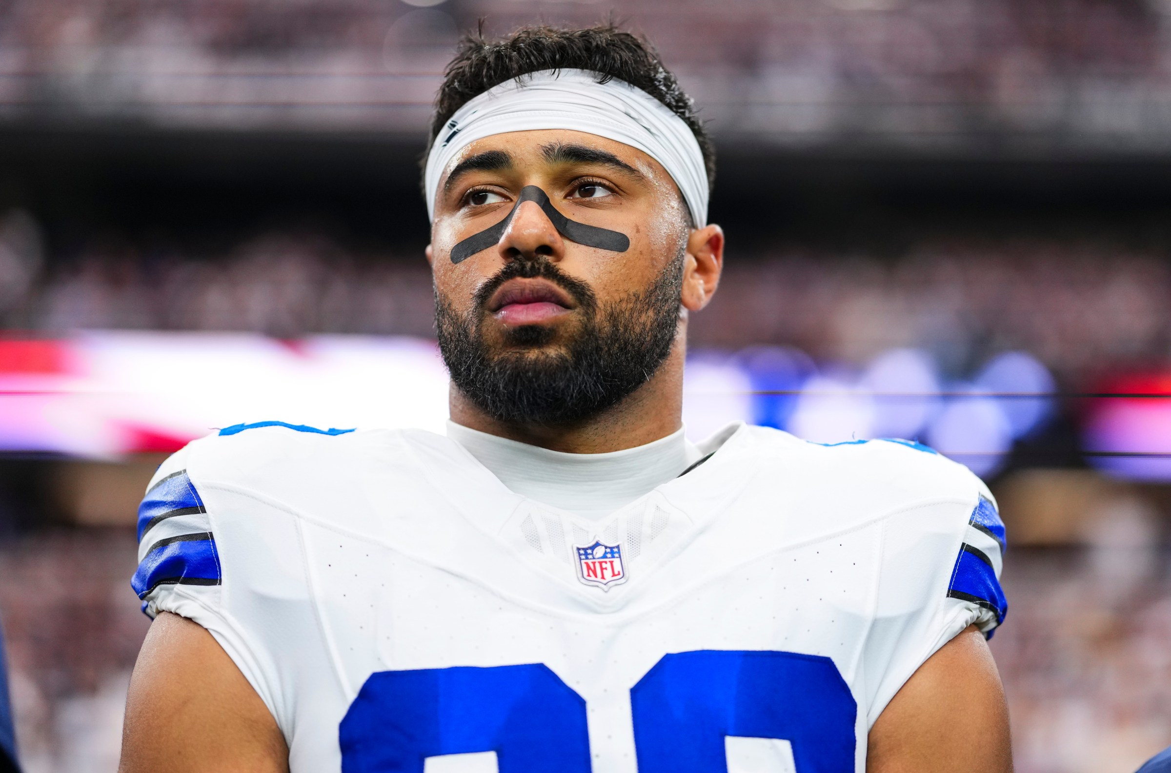 ARLINGTON, TX - SEPTEMBER 14: Brevyn Spann-Ford #89 of the Dallas Cowboys looks on from the sideline during the national anthem prior to an NFL football game against the New York Giants at AT&T Field on September 14, 2025 in Arlington, Texas. (Photo by Cooper Neill/Getty Images)