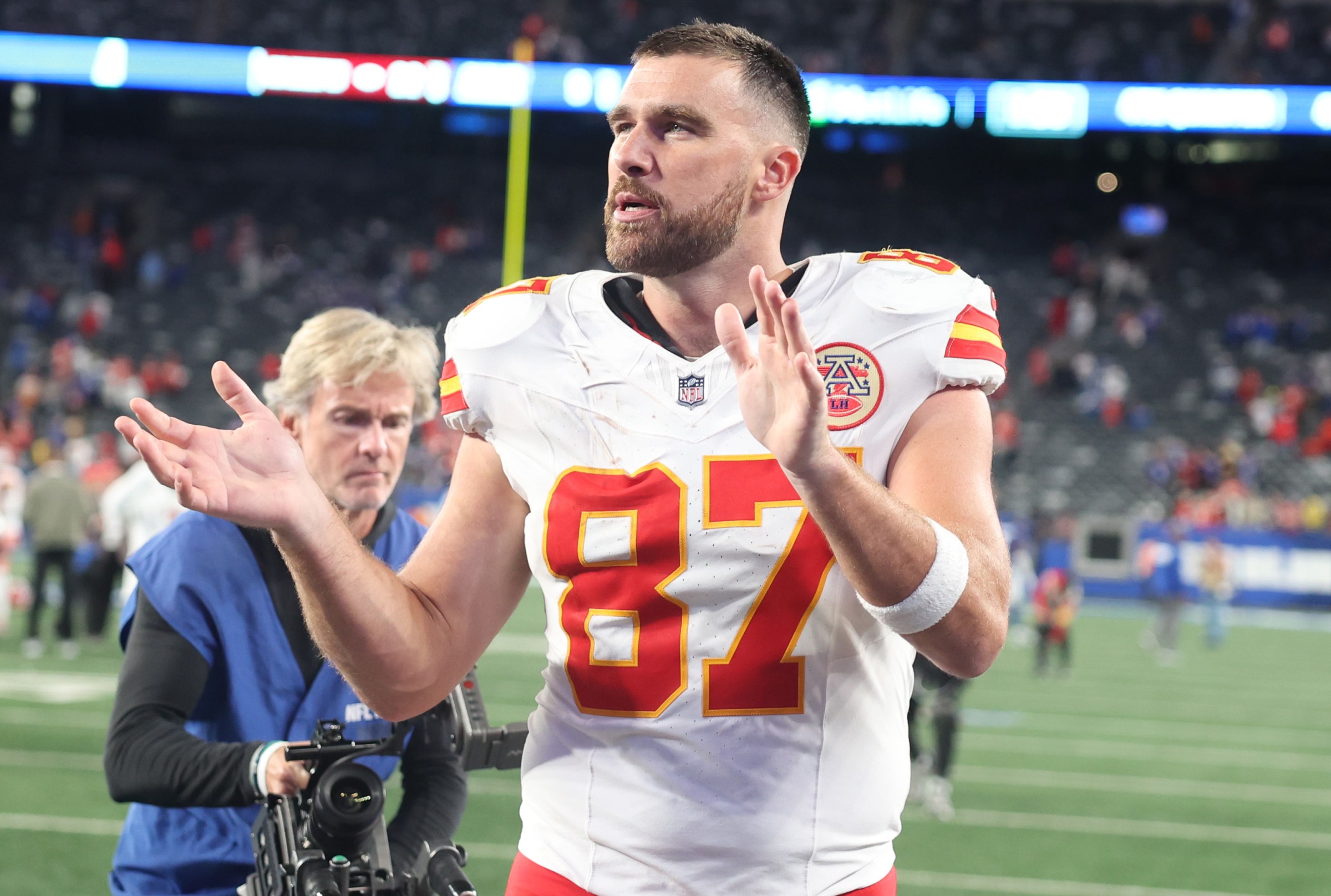 EAST RUTHERFORD, NEW JERSEY - SEPTEMBER 21: Travis Kelce #87 of the Kansas City Chiefs heads off the field following a game between the Kansas City Chiefs and the New York Giants at MetLife Stadium on September 21, 2025 in East Rutherford, New Jersey. (Photo by Elsa/Getty Images)