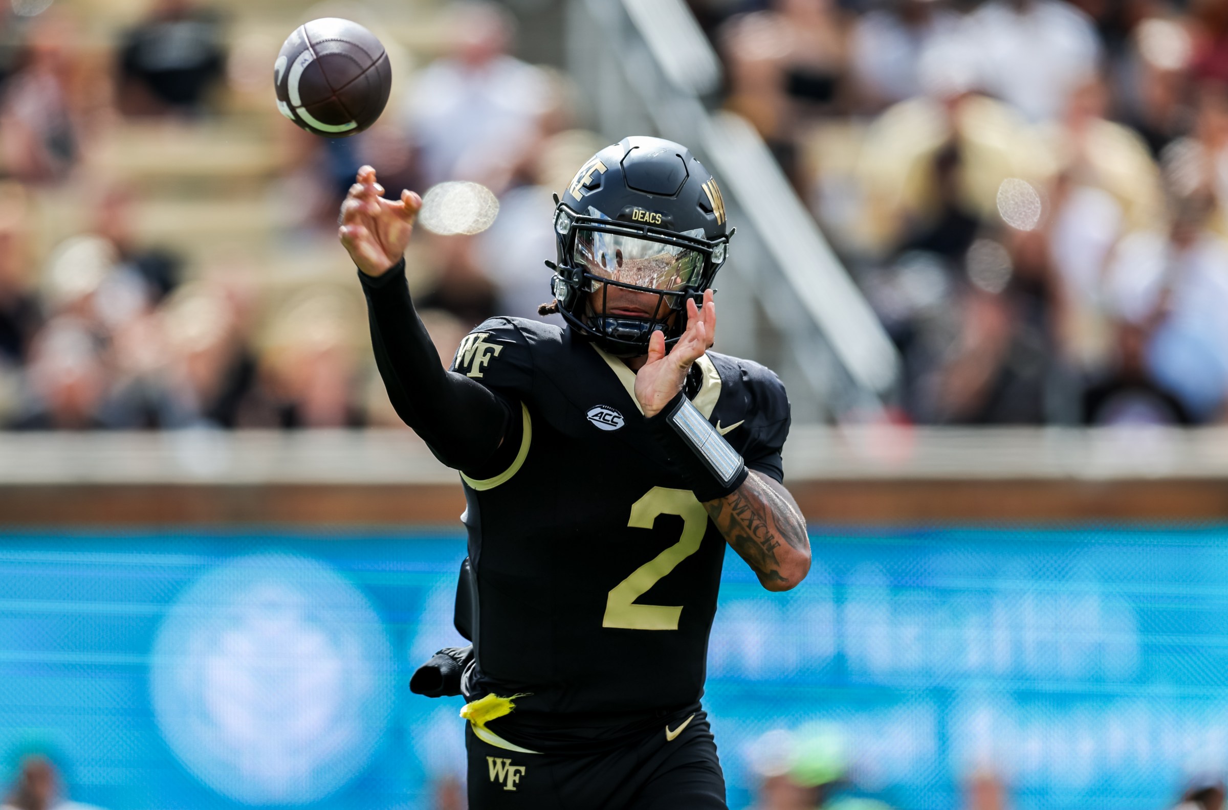 WINSTON-SALEM, NORTH CAROLINA - SEPTEMBER 27: Robby Ashford #2 of the Wake Forest Demon Deacons looks to pass the ball during the second half of a football game against the Georgia Tech Yellow Jackets at Allegacy Federal Credit Union Stadium on September 27, 2025 in Winston-Salem, North Carolina. (Photo by David Jensen/Getty Images)