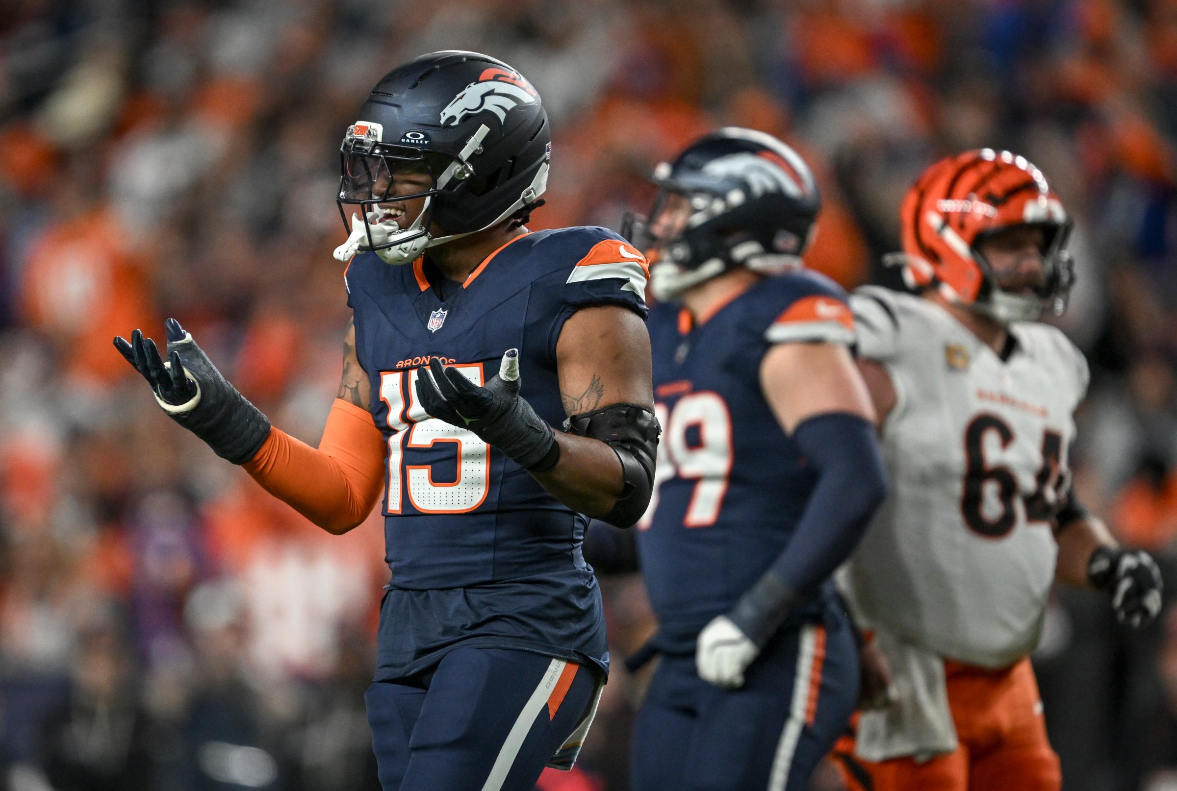 DENVER, CO - SEPTEMBER 29: Nik Bonitto (15) of the Denver Broncos celebrates sacking Jake Browning (6) of the Cincinnati Bengals during the third quarter at Empower Field at Mile High on Monday, September 29, 2025. (Photo by AAron Ontiveroz/The Denver Post)