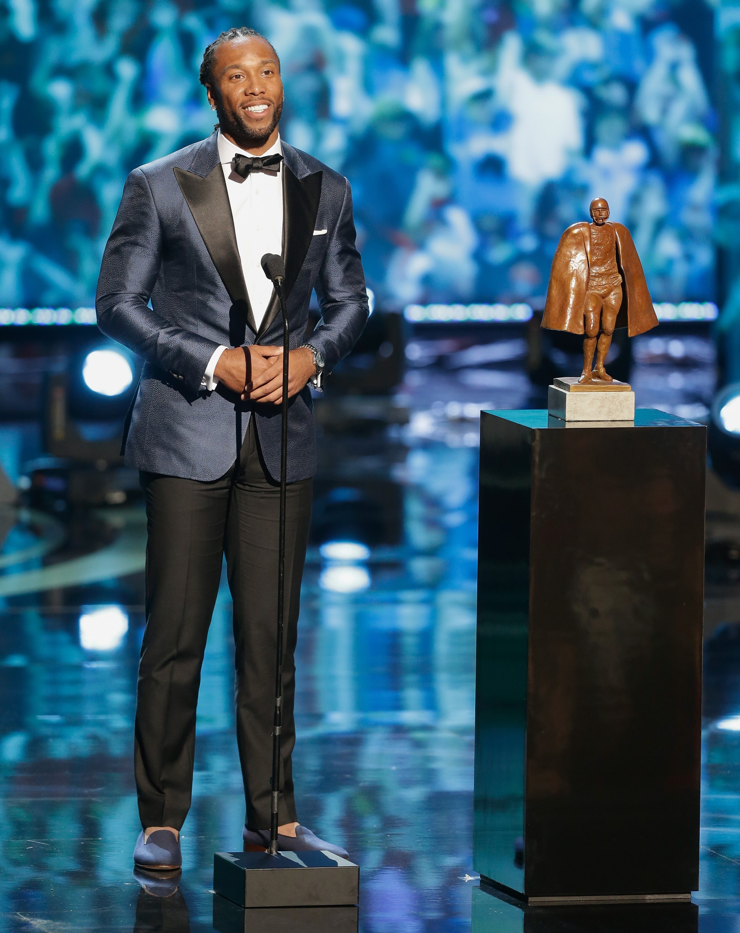 HOUSTON, TX - FEBRUARY 04: Larry Fitzgerald accepts the Walter Payton NFL Man of the Year presented by Nationwide at Wortham Theater Center on February 4, 2017 in Houston, Texas. Eli Manning also received the award this year. (Photo by Bob Levey/Getty Images)