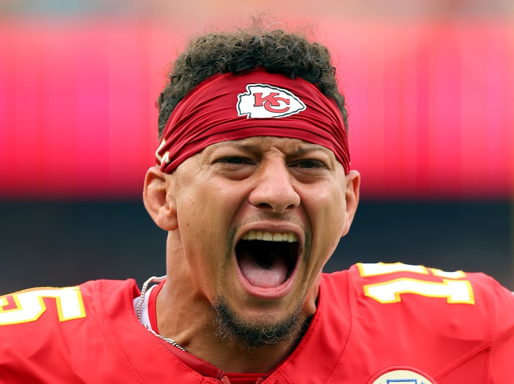 Close-up of Patrick Mahomes yelling during a game.