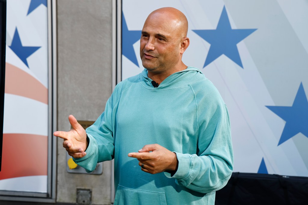 Host Craig Carton in a light blue hoodie, speaking at Fox News Channel Studios.