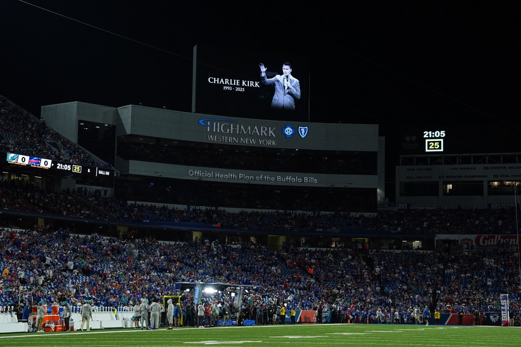 A video board at a Buffalo Bills game shows a tribute to Charlie Kirk.