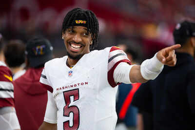 Tom Brady’s sideline moment with Jayden Daniels' mom becomes talk of Commanders' victory in stunning season opener