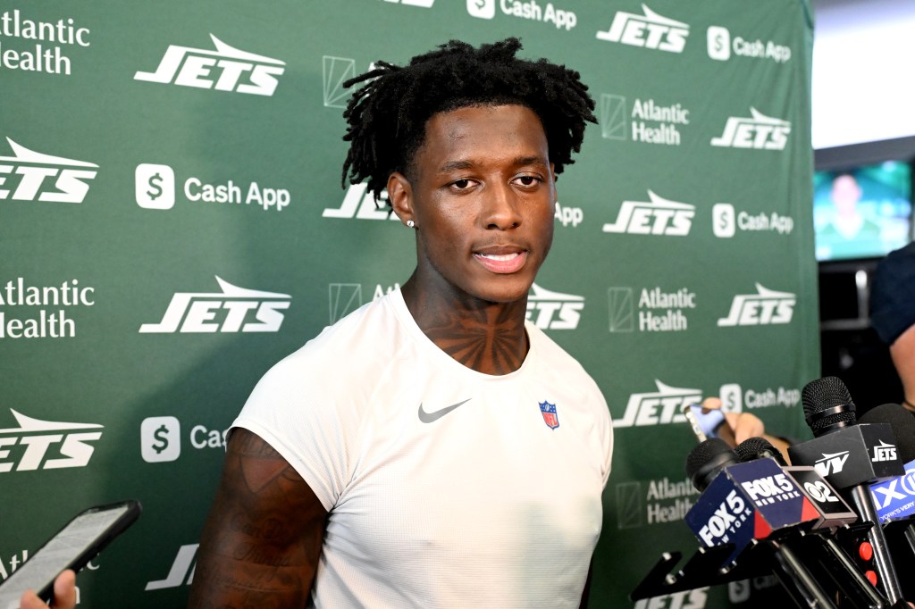 Jets cornerback Sauce Gardner at a press conference.