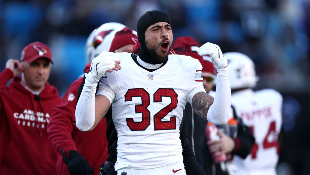 Cardinals' Joey Blount looks on...