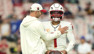 Cardinals' Jonathan Gannon and Kyler Murray chat during Thursday Night Football...