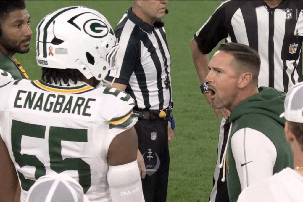 Packers coach Matt LaFleur screams at Kingsley Enagbare on the Packers sideline.