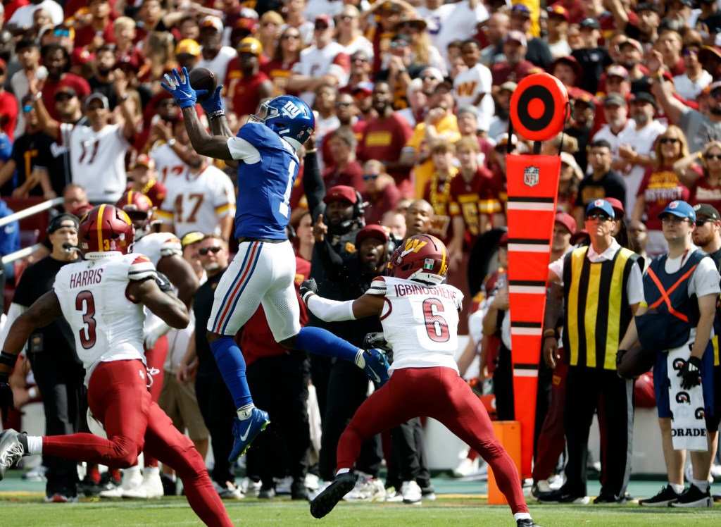 New York Giants wide receiver Malik Nabers making a catch during a game against the Washington Commanders.