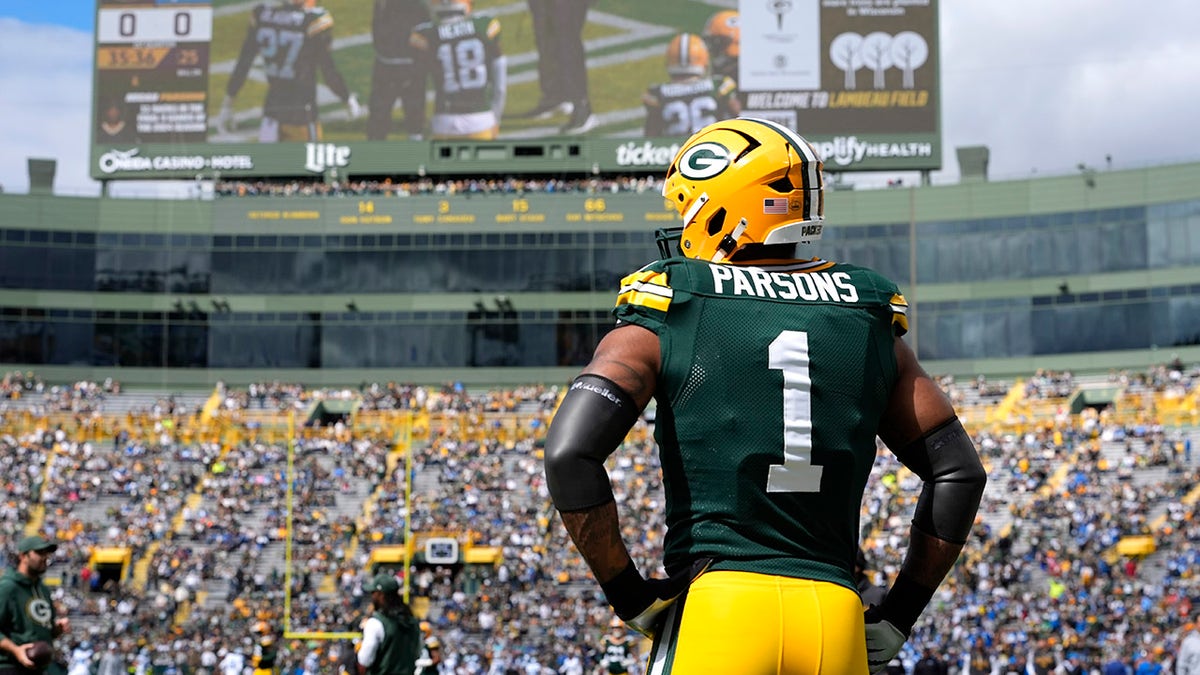 Micah Parsons looks on field