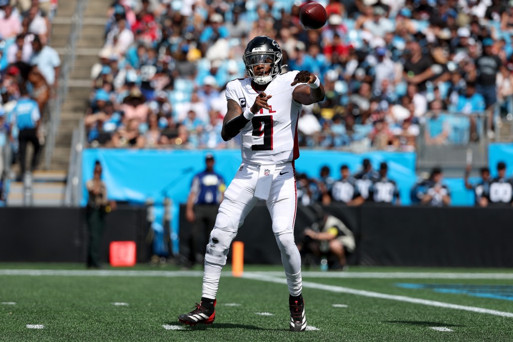 Michael Penix Jr. #9 of the Atlanta Falcons throws the ball during the third quarter against the Carolina Panthers.