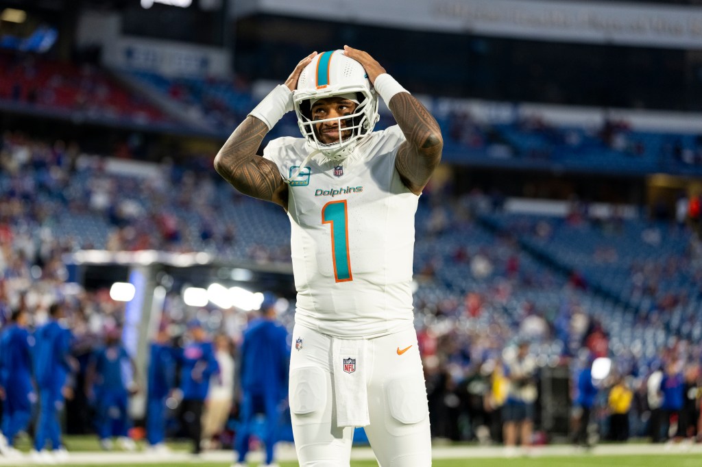 Miami Dolphins player Tua Tagovailoa on the field.