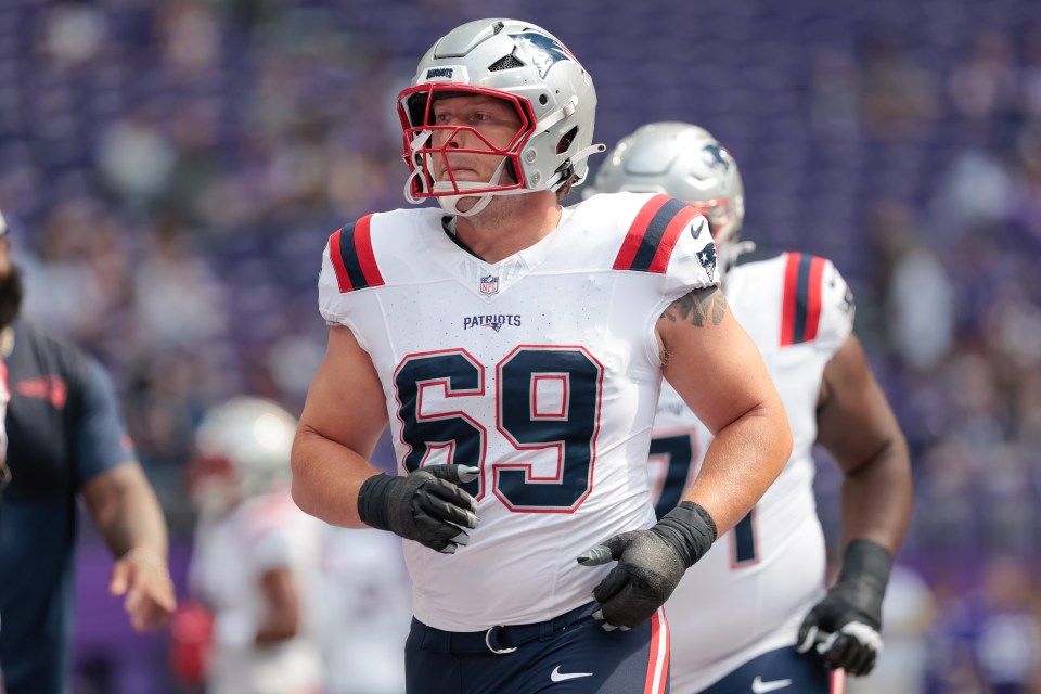 Cole Strange, #69, New England Patriots guard, warming up before a game.