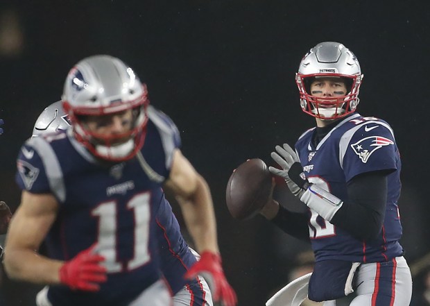 FOXBORO MA. - JANUARY 4: New England Patriots quarterback Tom Brady targets Julian Edelman during the 3rd quarter of the Wild Card game at Gillette Stadium on January 4, 2020 in Foxboro, MA. (Staff Photo By Nancy Lane/MediaNews Group/Boston Herald)