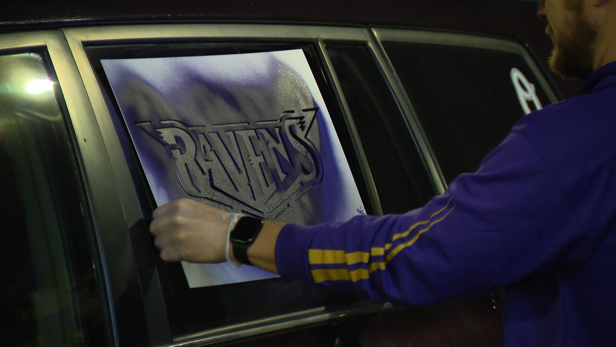 Fans line up early for Ravens stenciling ahead of home opener