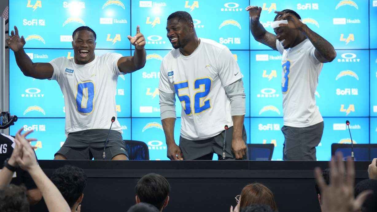 Chargers coach Jim Harbaugh say he's excited about the opportunity to play on 'a world stage'