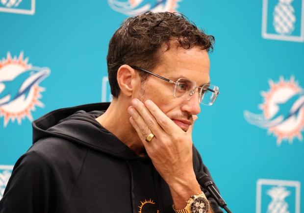 Miami Dolphins head coach Mike McDaniel speaks before practice at...
