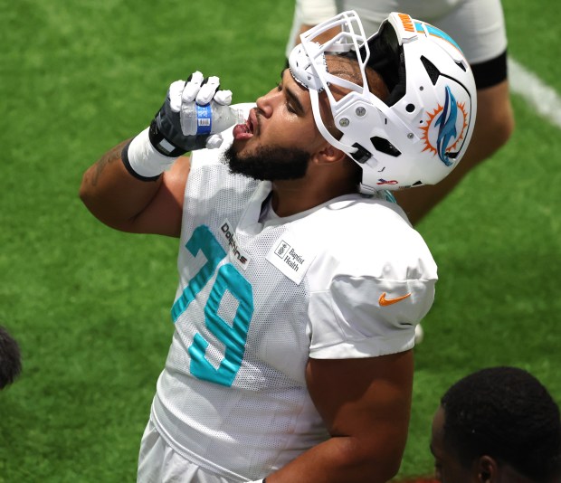 Miami Dolphins offensive lineman Larry Borom during practice at the...